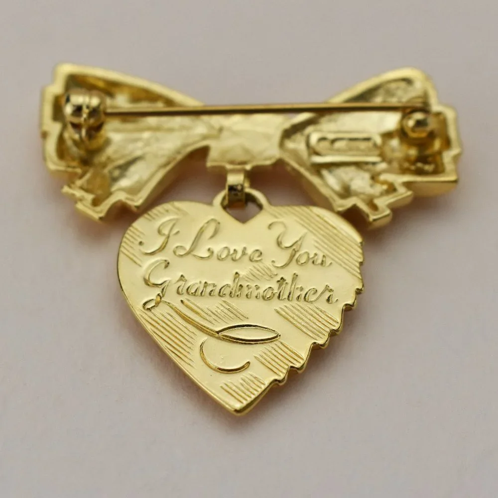 Small gold bow and heart brooch, elegant basic lapel pin